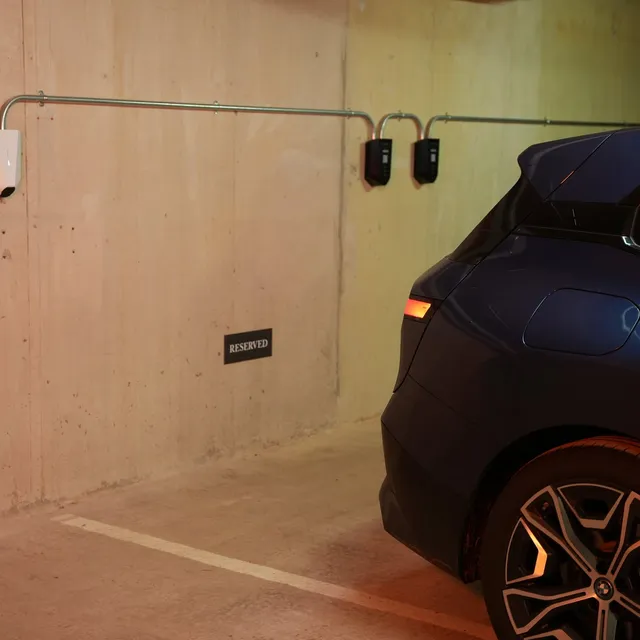 Row of Easee chargers in an apartment car park