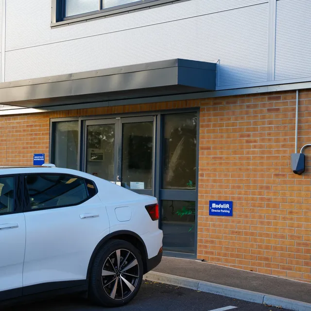 Commercial EV charging bays at a business premises