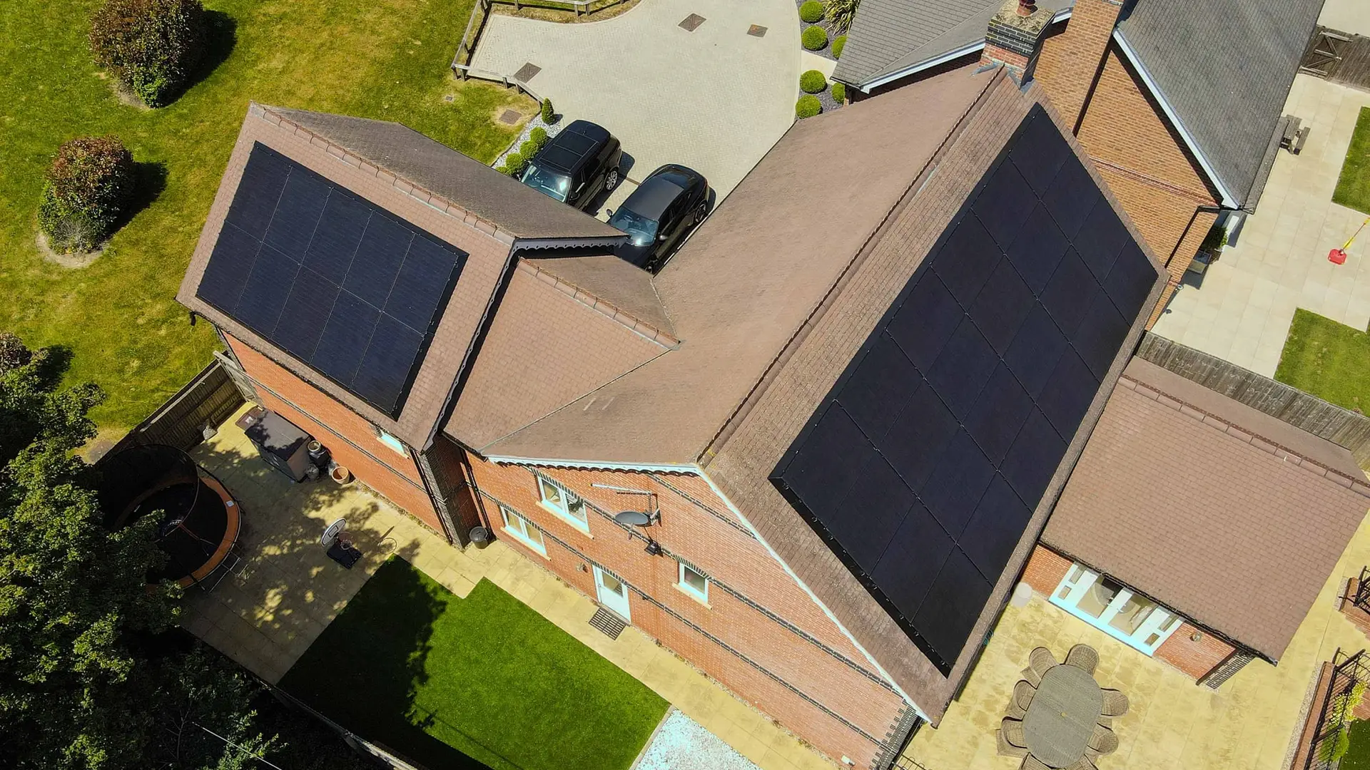 Completed solar array on a roof photographed from a drone