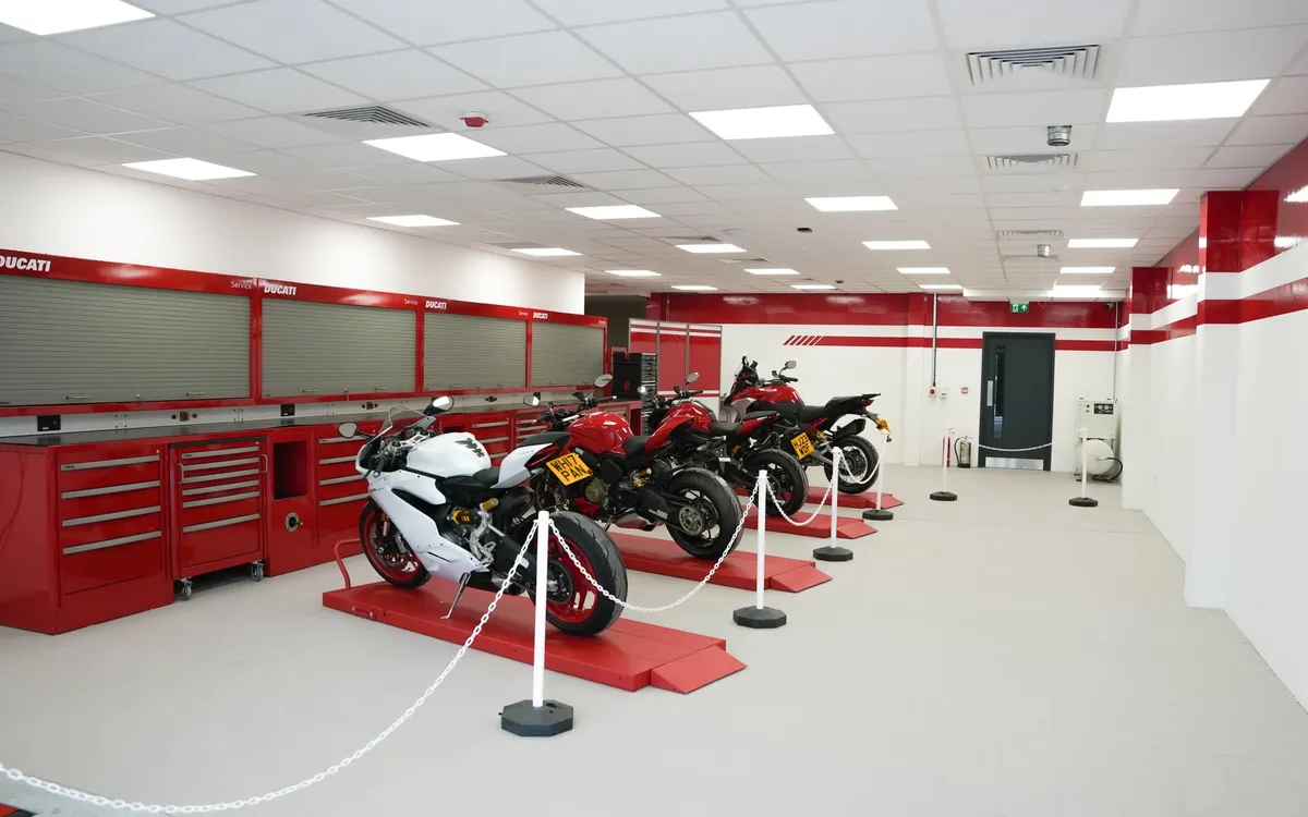 Service workshop at Ducati Bournemouth with its new LED panels and emergency lighting