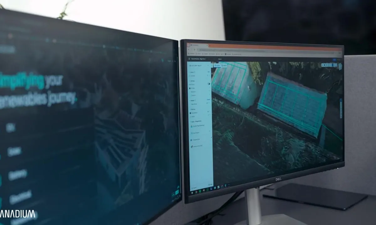 3D drone model of a roof with the panel layout drawn on it, on a designer's screen in our office