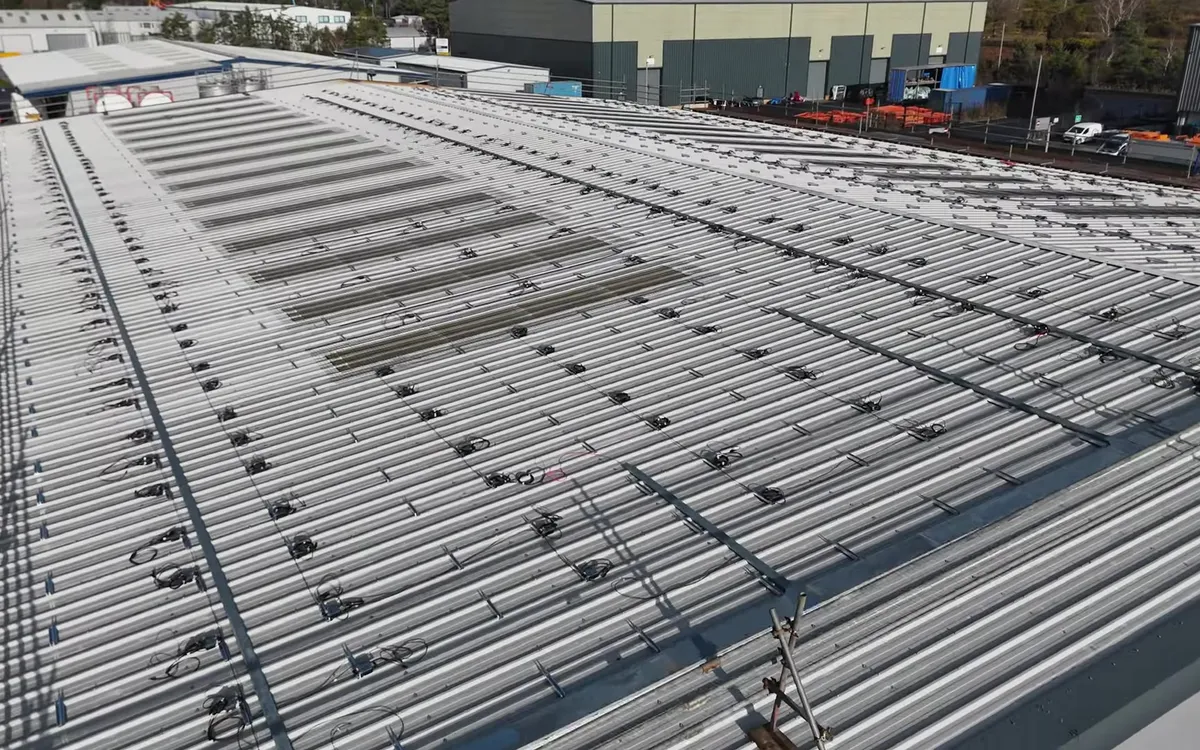Close-up aerial view of Modulift's roof with solar panel mounting rails installed.